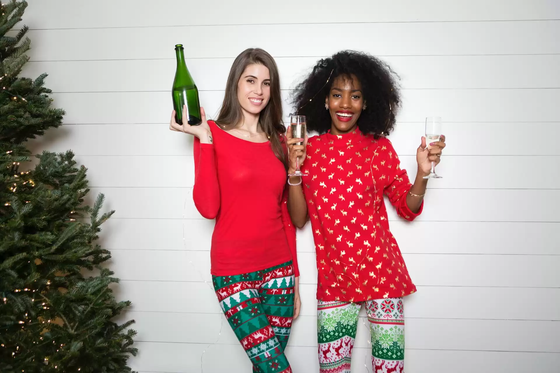 Two women enjoying a holiday party